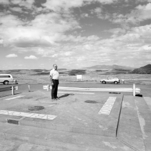 Man in Four States Four Corners, Arizona-New Mexico-Colorado-Utah. 36°59'56.4